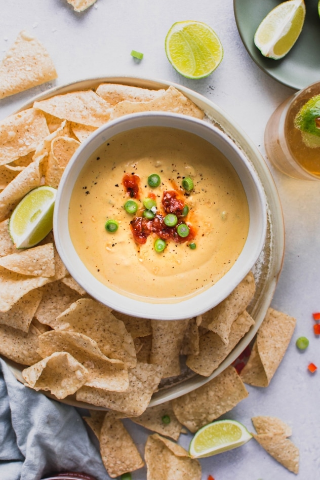 This creamy cashew queso dip is made with ZERO processed ingredients, for an authentic tasting, full flavored, dairy free alternative to this well loved dip. SO crave worthy and made with anti-inflammatory, good-for-you ingredients! Vegan + whole30 compliant.