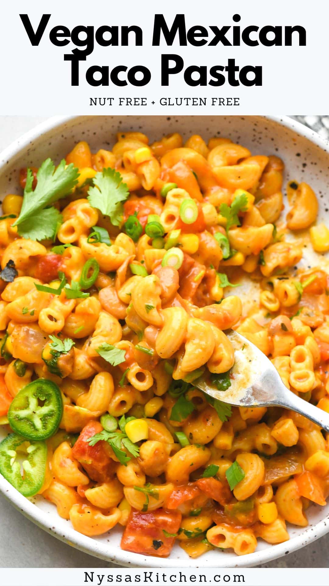 This vegan Mexican taco pasta is a delicious dairy free & gluten free comfort food meal with some serious southwest mac and cheese vibes. Made on the stove top with a nut free cheese sauce, sweet corn, pinto beans, bell pepper, tomatoes, and some sneaky veggies. A healthy meat free recipe that is FULL of flavor and good-for-you ingredients! Vegan, vegetarian, gluten free, nut free.