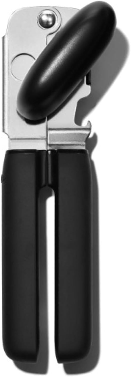 A metal can opener with black handles and a black turning knob, photographed against a white background.