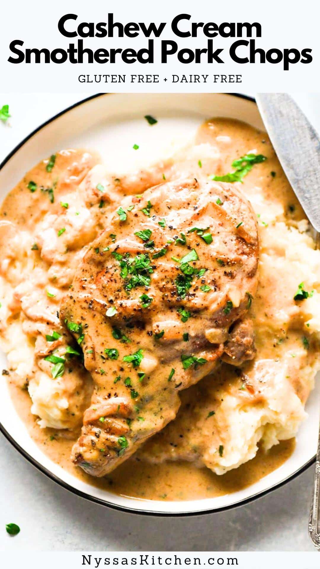 These smothered pork chops made with cashew cream instead of dairy are the perfect healthy comfort food! The sauce is made with sweet caramelized onions, flavorful herbs, and a smooth and luscious cashew cream that is 100% dairy free. An ideal cold weather dinner that will warm you up from the inside out. Recipe is gluten free, dairy free, whole30 compatible, and paleo friendly.
