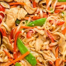 Loaded GF Rice Noodle Stir Fry with Chicken and Crispy Garlic