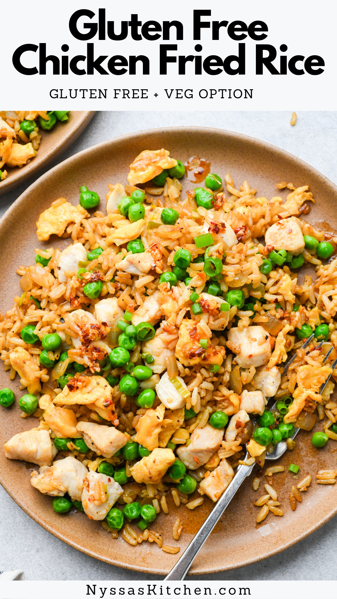 Gluten free chicken fried rice - a truly delicious (& easy!) recipe for fried rice that is arguably better than takeout. Crispy, perfectly seasoned rice, scrambled eggs, sweet peas, and green onions bring this dish to life for a dinner that the whole family will love! Gluten free, soy free option, vegetarian option.
