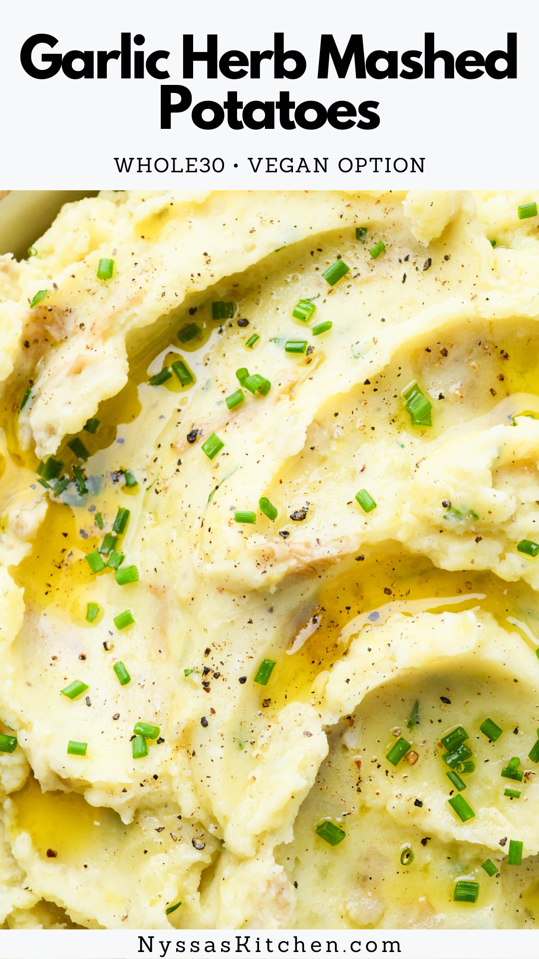 Whole30 garlic herb mashed potatoes are the healthy homemade comfort food side dish you need! Made with buttery Yukon gold potatoes, garlic infused ghee, and a generous handful of fresh herbs. They are savory, creamy, and absolutely irresistible. Whole30, paleo, gluten free, and vegan option.