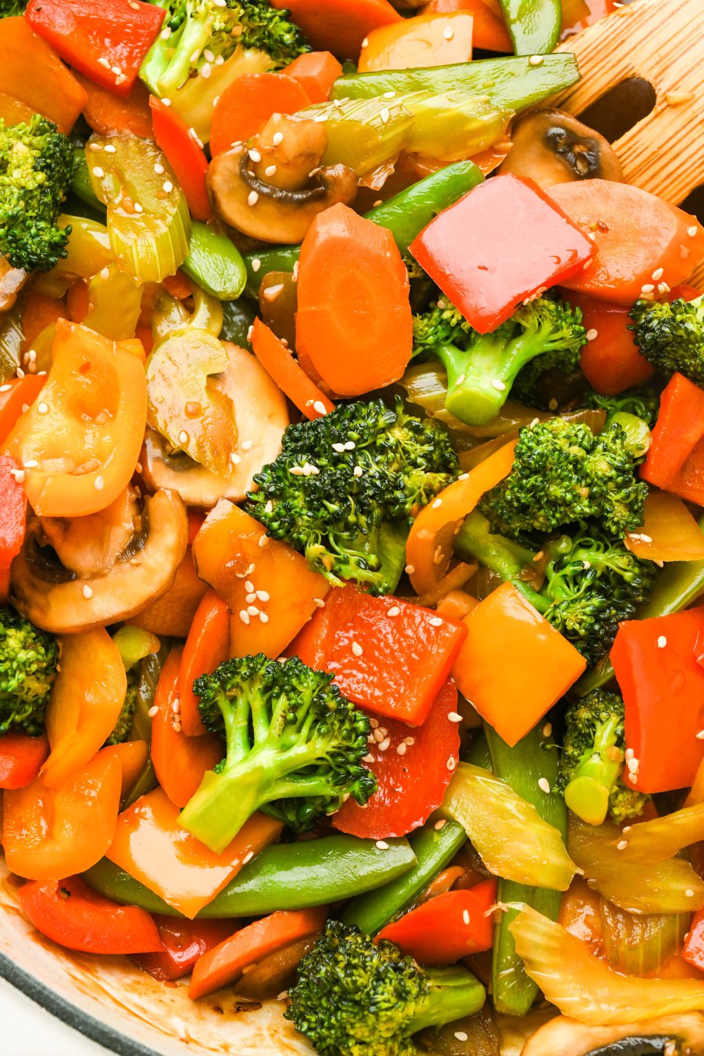 Close up image of a variety of vegetables in a stir fry made with homemade stir fry sauce. 