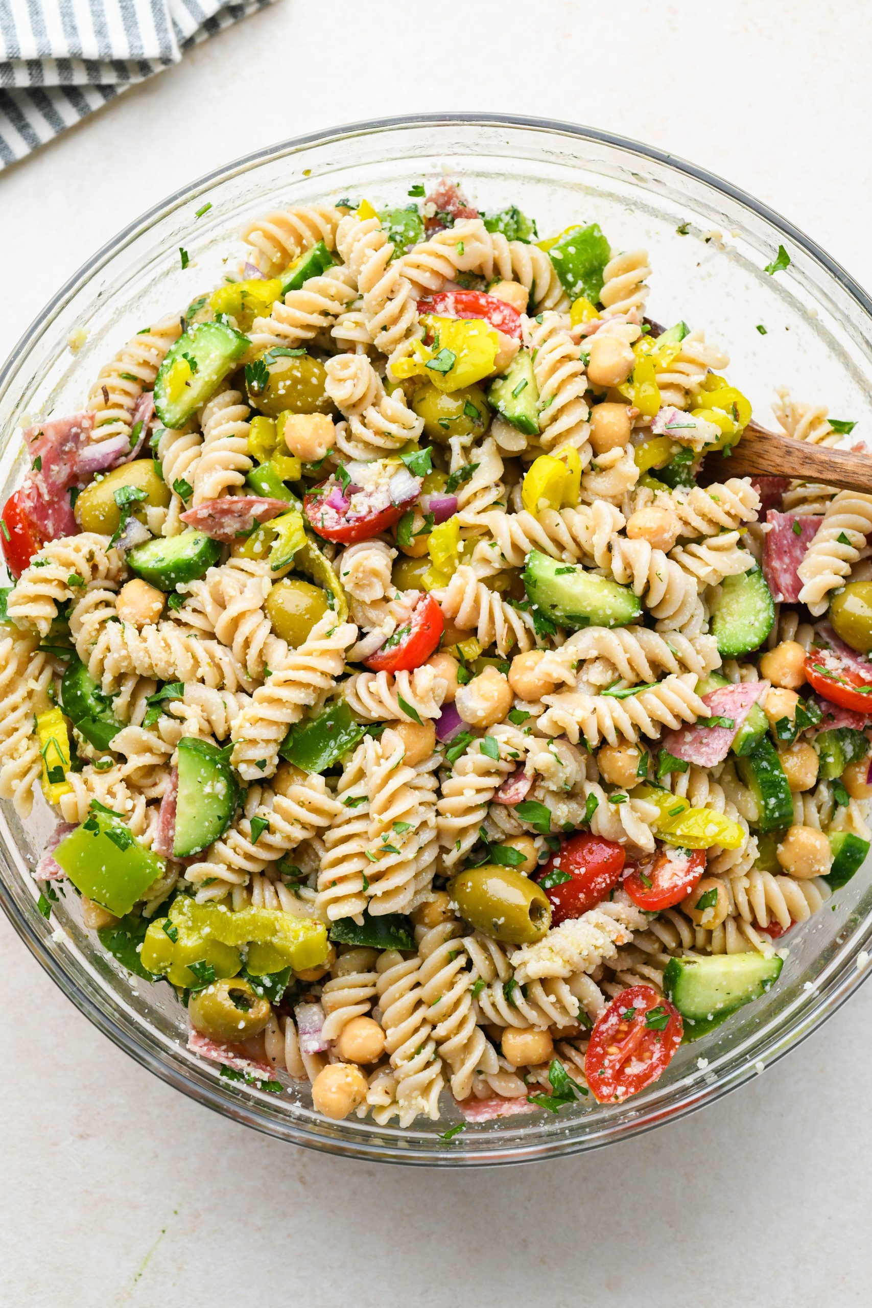 How to make Easy Gluten Free Italian Pasta Salad: Pasta salad tossed together with dressing.
