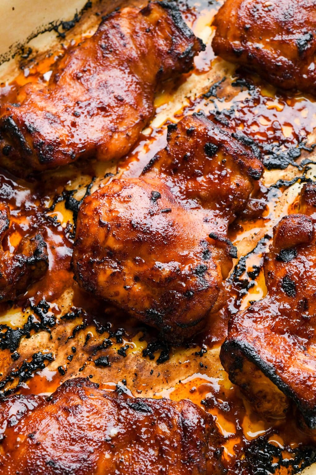 How to make BBQ Chicken Thighs in the Oven: Crispy and caramelized baked bbq chicken thighs.