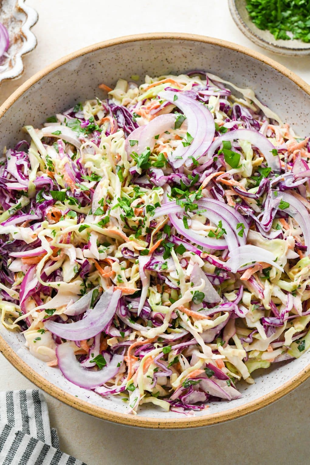 Side angle view of creamy Whole30 coleslaw.