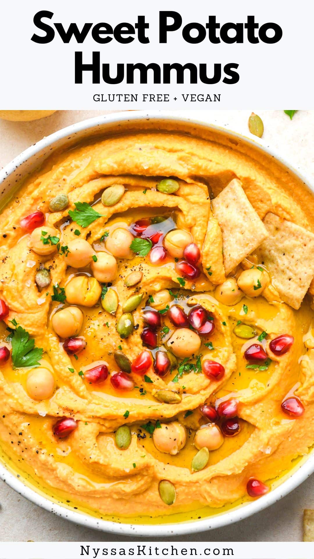 Sweet potato hummus is an extra yummy seasonal twist on a classic hummus recipe that makes the best healthy snack or appetizer for your next get together (or weekly meal prep)! Made with chickpeas, roasted sweet potatoes, a blend of flavorful spices, tahini, and lemon juice. A perfect snack for dipping your favorite crackers and veggies. Gluten free, vegan, dairy free.