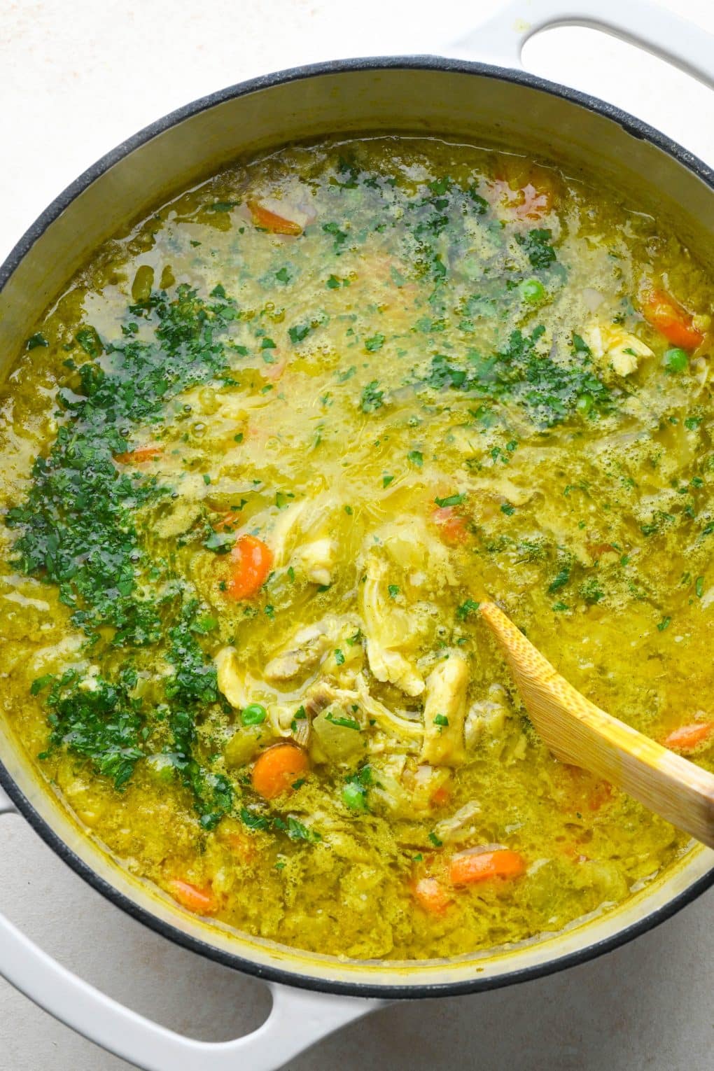 How to make Anti Inflammatory Turmeric Chicken Soup: Stirring everything together.