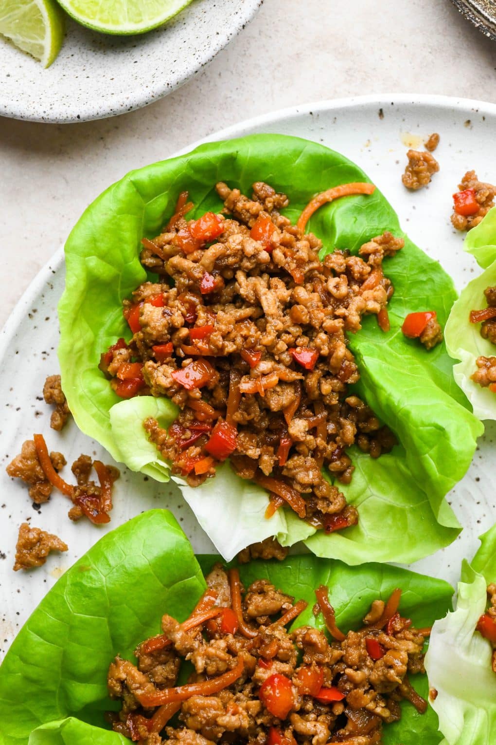 How to make Pork Lettuce Wraps: Ground pork mixture piled into a lettuce cup.