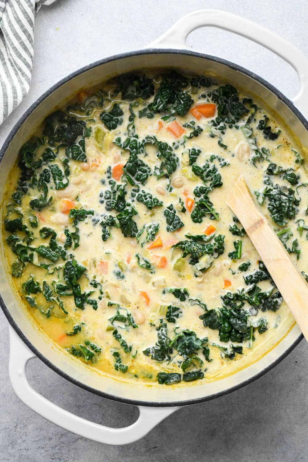How to make White Bean and Kale Soup: Raw kale mixed into the soup.