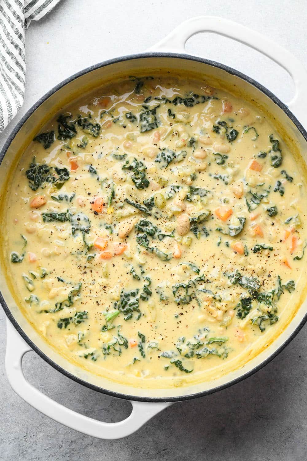 How to make White Bean and Kale Soup: Soup simmered and kale wilted.