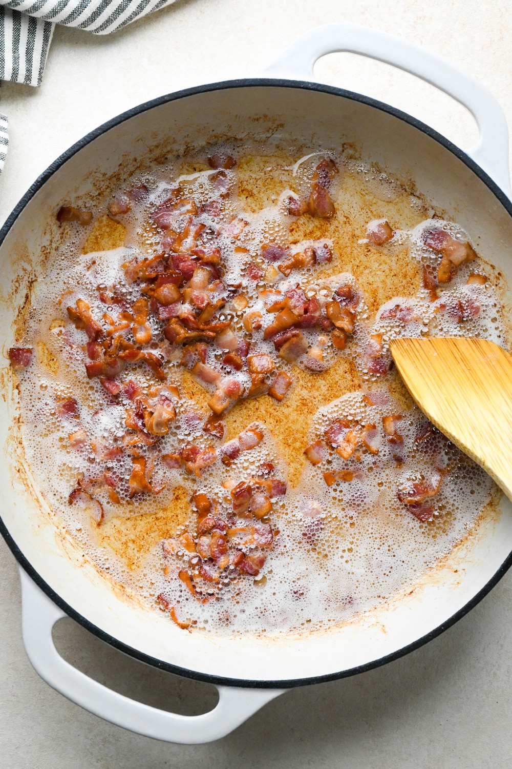 How to make Dairy Free Butternut Squash Pasta: Diced bacon in a skillet after cooking.
