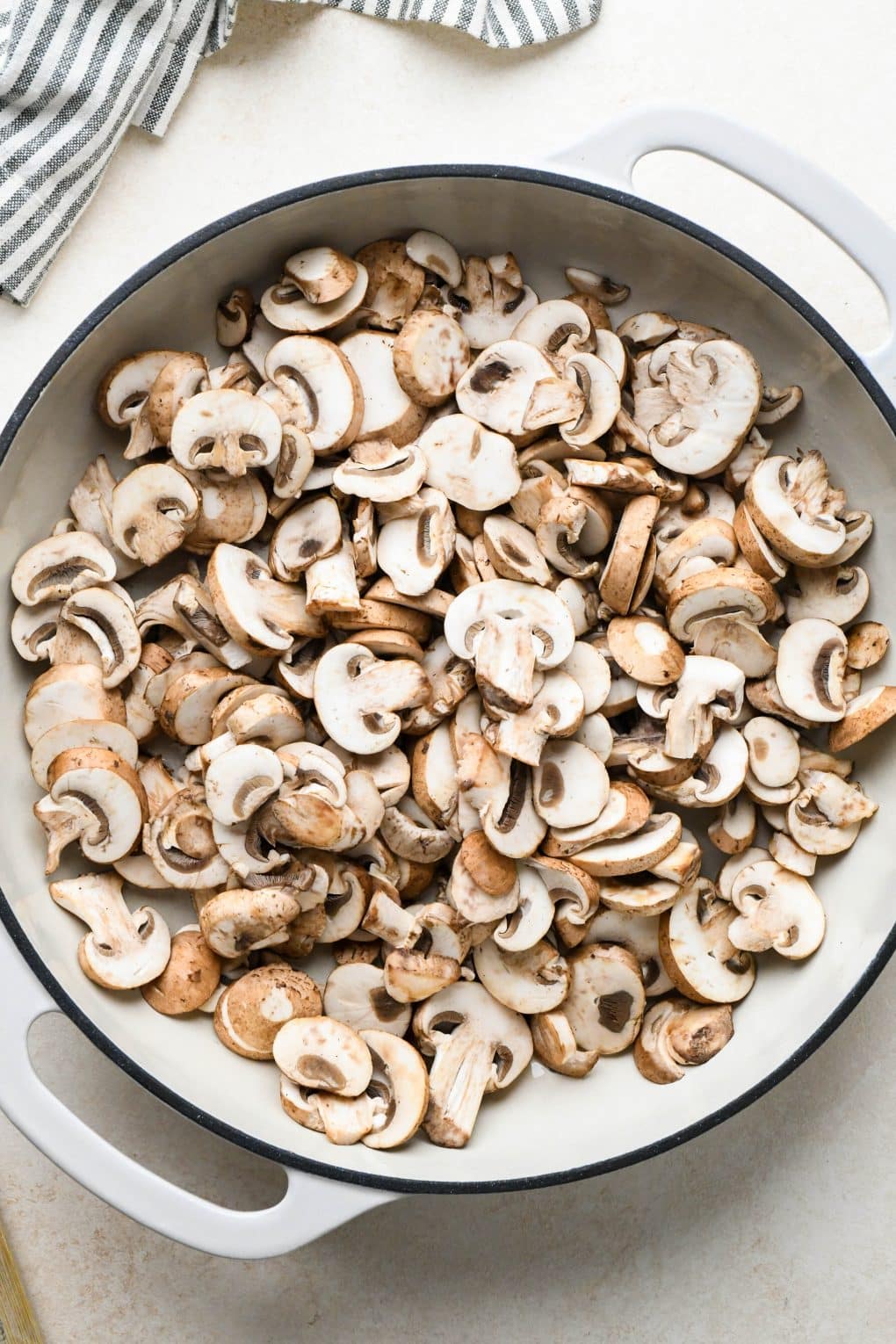 How to make Dairy Free Beef Stroganoff: Mushrooms in skillet before sautéing. 