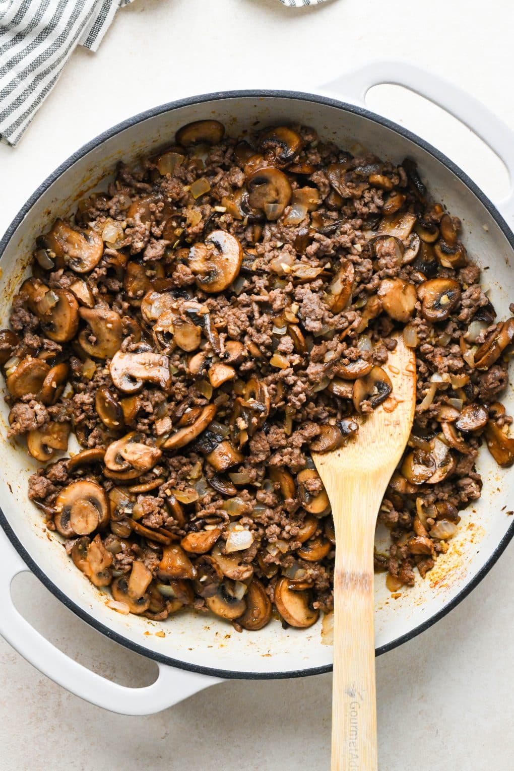 How to make Dairy Free Beef Stroganoff: Mushrooms added back to the skillet with spices, before stirring together.