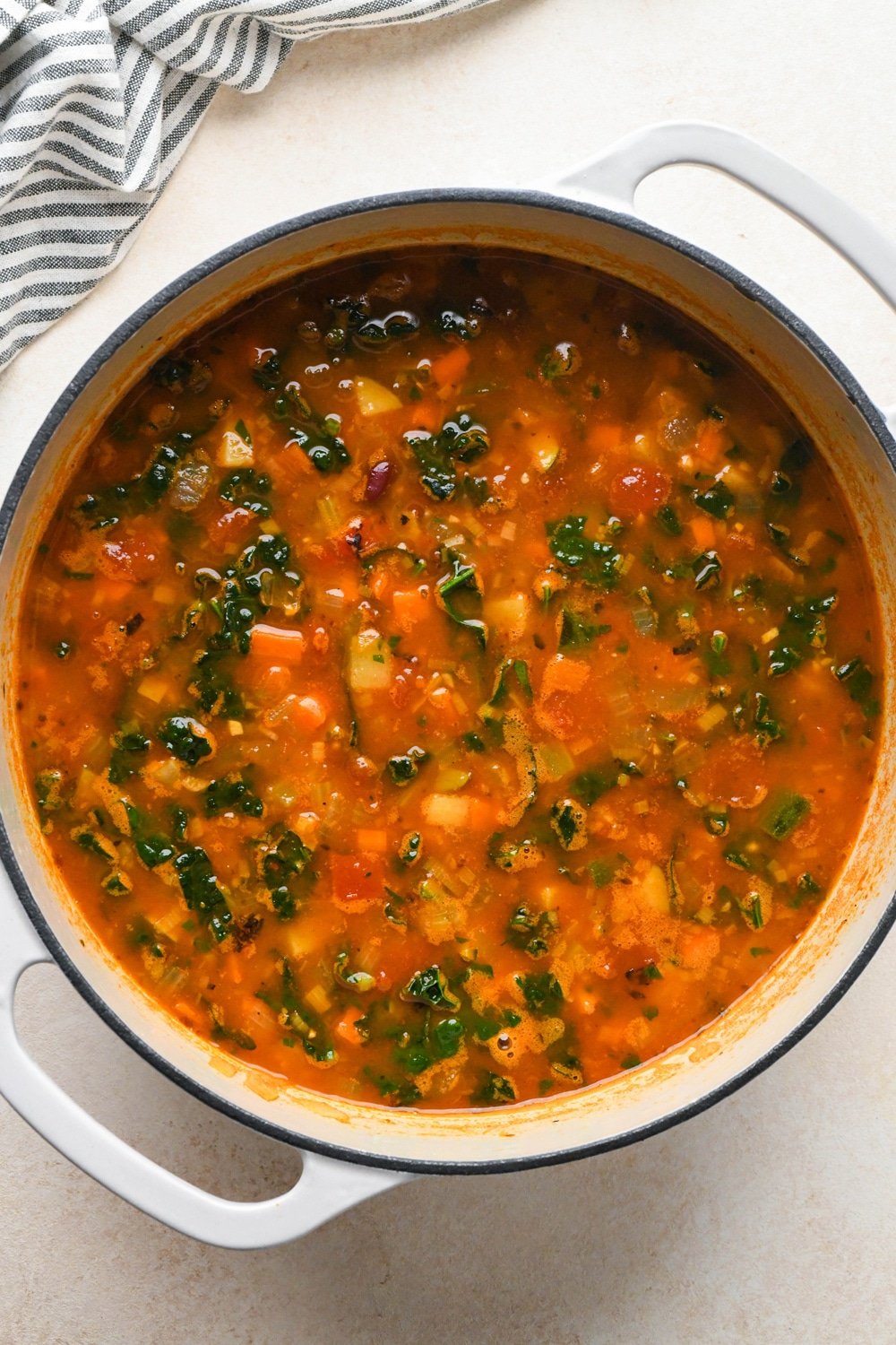 How to make Gluten Free Minestrone Soup: Kidney beans, chopped lacinato kale, and chopped fresh parsley added to the soup after cooking.