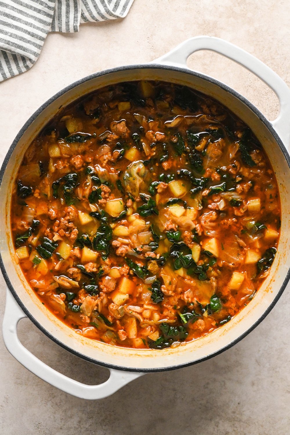 How to make Brothy Sausage and Potato Soup with Kale and Cabbage: Soup after simmering with the kale and parsley.