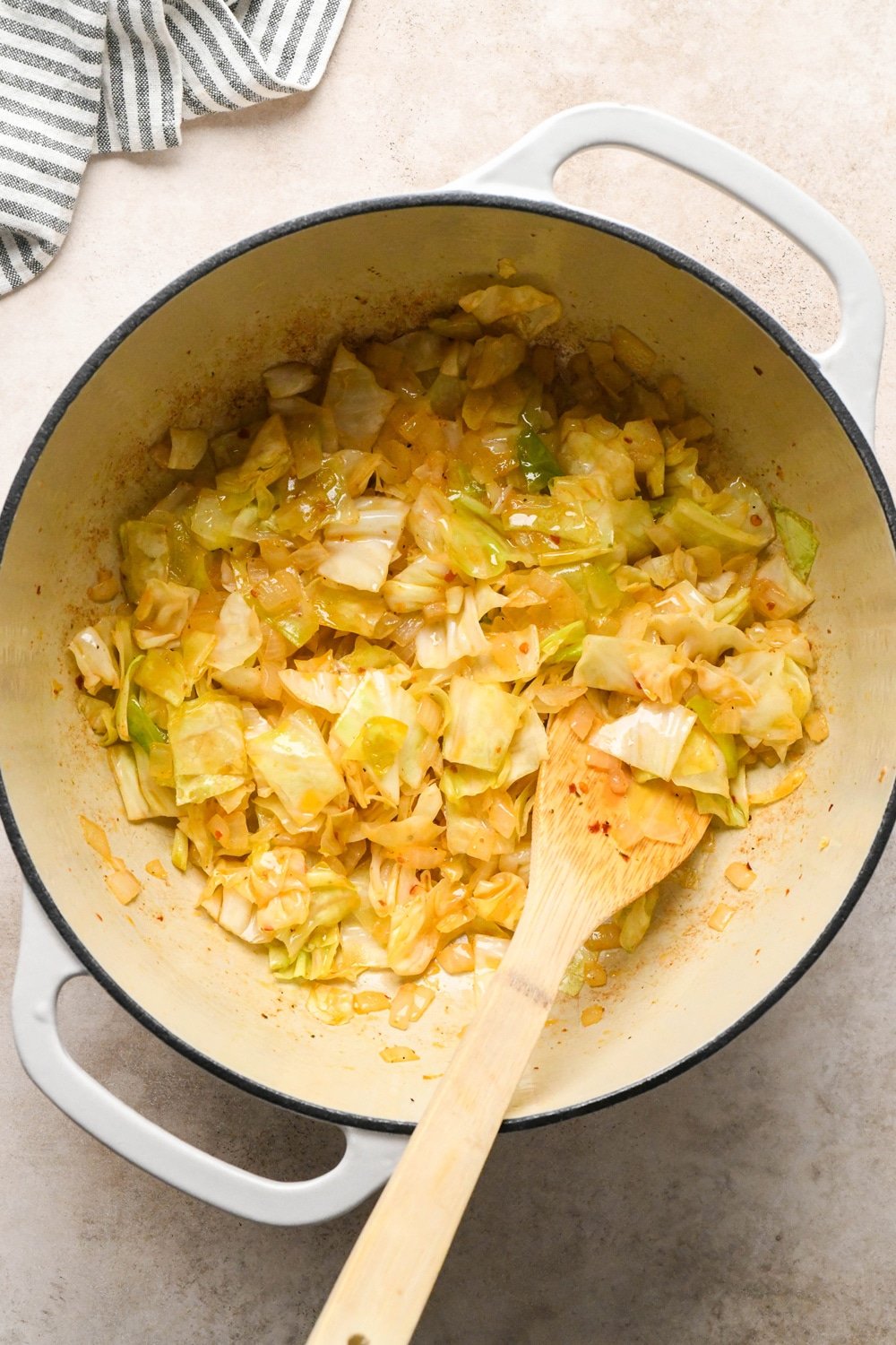 How to make Brothy Sausage and Potato Soup with Kale and Cabbage: Cabbage and onions in the pot after cooking.