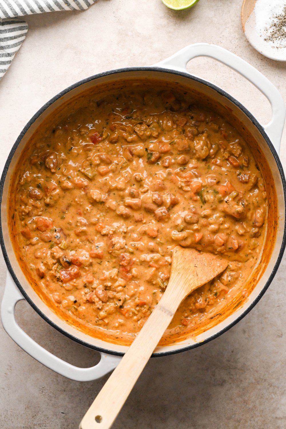 How to make Cashew Cream Buffalo Chicken Chili Made with Ground Chicken: Cashew cream in the pot of soup with drained beans and chopped cilantro stirred into the soup, after simmering to thicken.