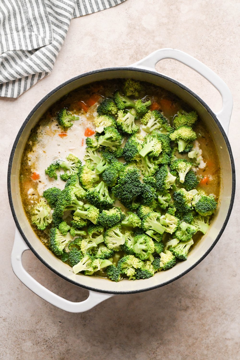 How to make Chicken and Broccoli Soup: Soup pot with cashew cream and broccoli added.